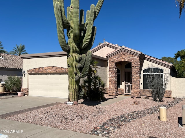 view of front of property featuring a garage