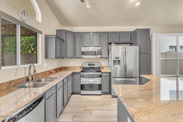 kitchen with light hardwood / wood-style floors and stainless steel appliances