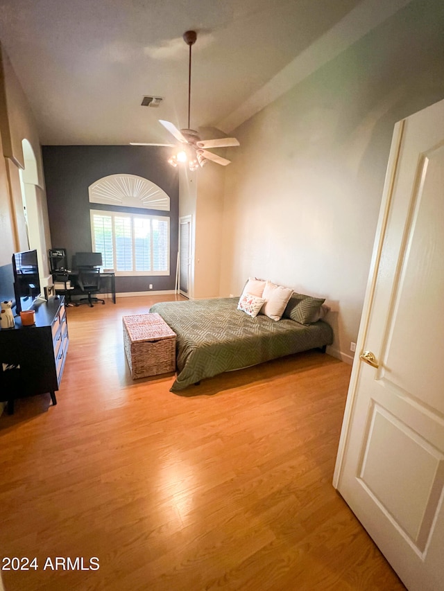 bedroom with light wood-type flooring and ceiling fan