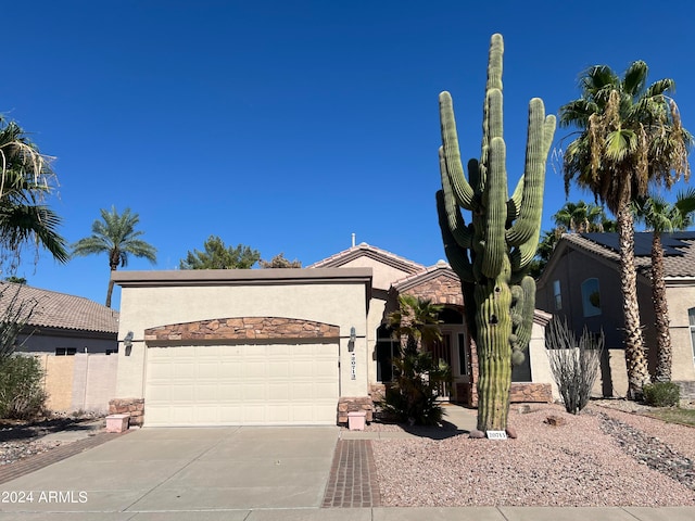 view of front of property featuring a garage