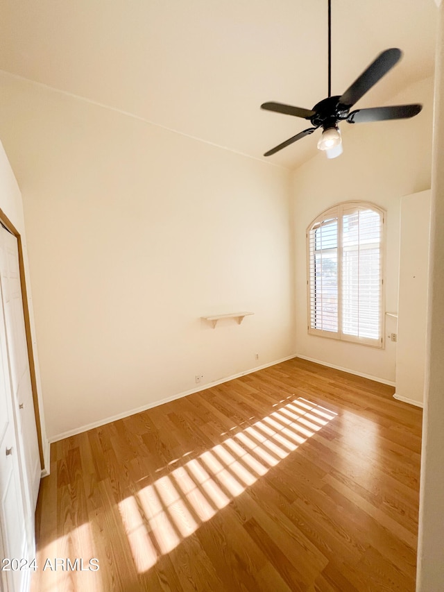 unfurnished room with ceiling fan and light hardwood / wood-style flooring