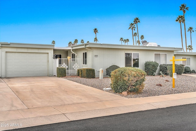 single story home with a garage