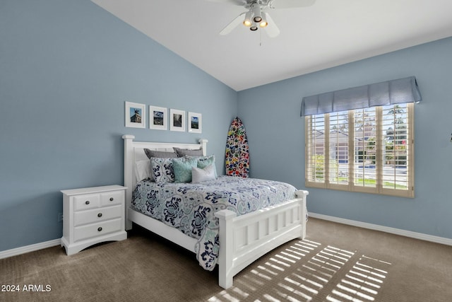 bedroom with ceiling fan, carpet, and lofted ceiling