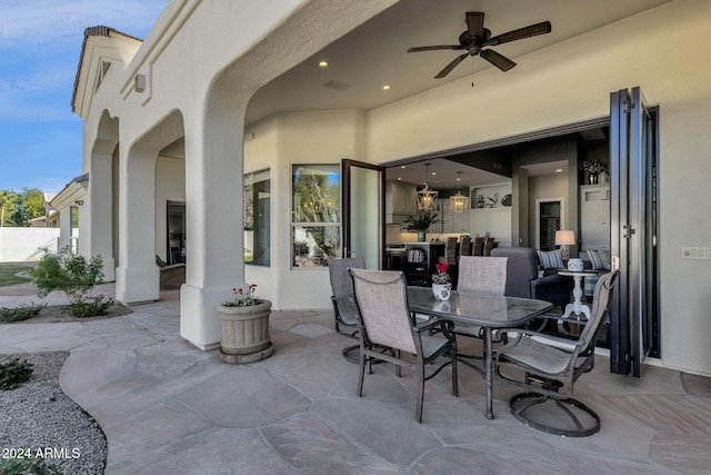 view of patio with ceiling fan