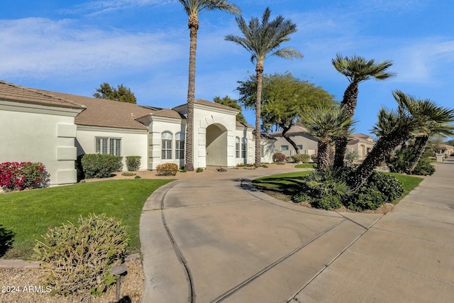 view of front of property with a front lawn