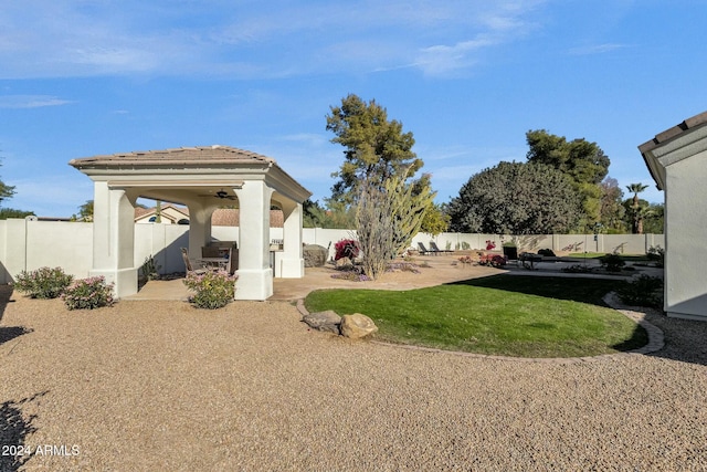 view of yard with a gazebo and a patio