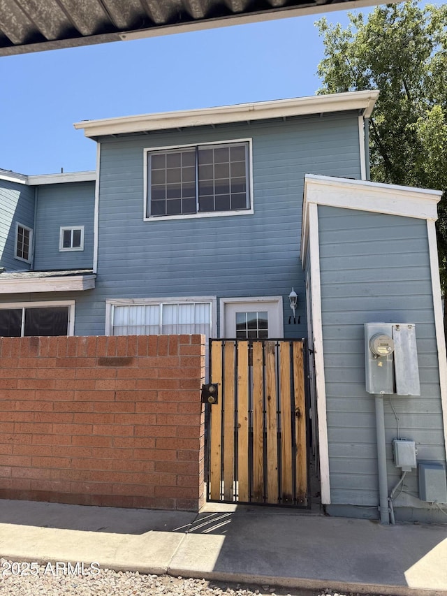 2301 E University Dr Unit 111, Mesa, AZ 85213 - view of front of house featuring a gate