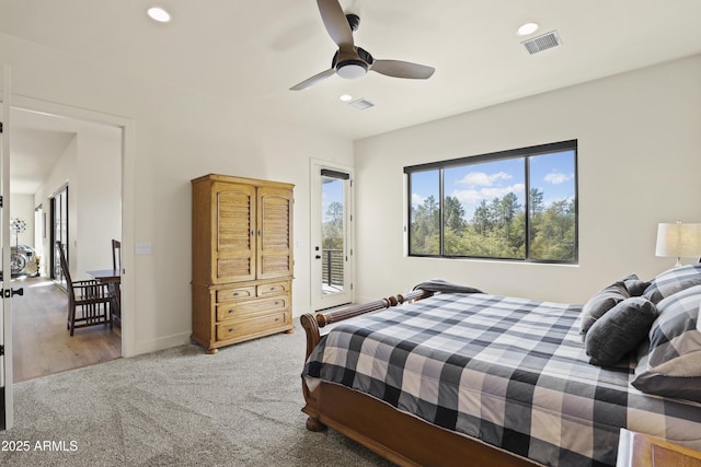 bedroom with access to exterior, visible vents, and recessed lighting