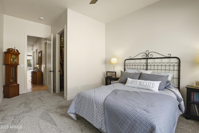 carpeted bedroom featuring a ceiling fan