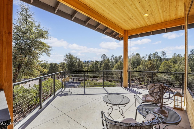 view of patio with a balcony