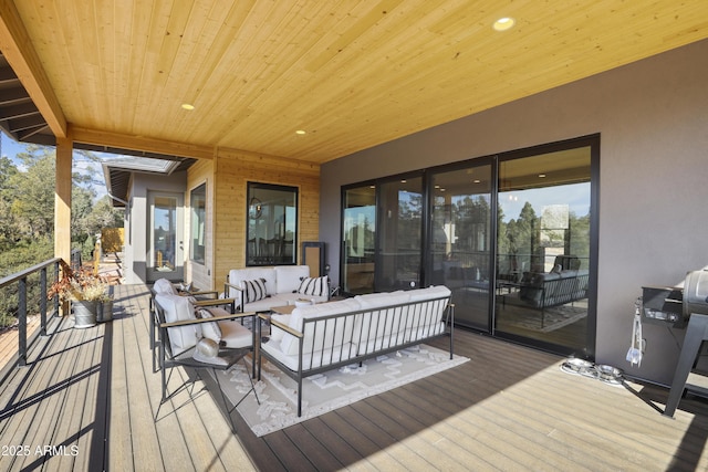 wooden deck featuring an outdoor living space