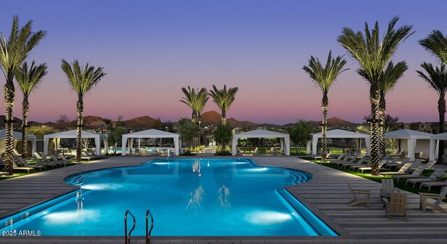 26421 N 24th Gln, Phoenix, AZ 85085 - pool at dusk with a gazebo and a community pool