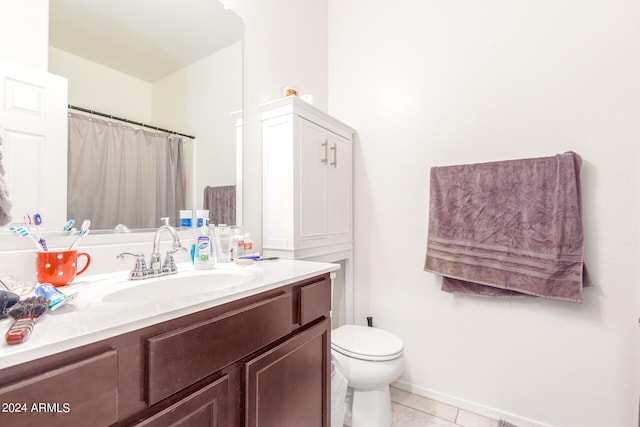 full bath featuring toilet, tile patterned floors, and vanity