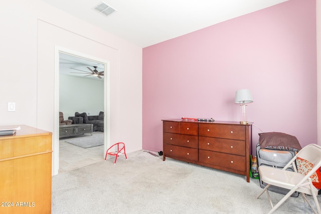 interior space featuring visible vents and light colored carpet