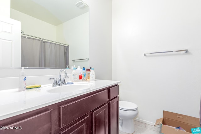 bathroom featuring curtained shower, toilet, visible vents, vanity, and tile patterned floors