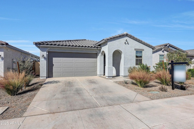 view of front of property with a garage