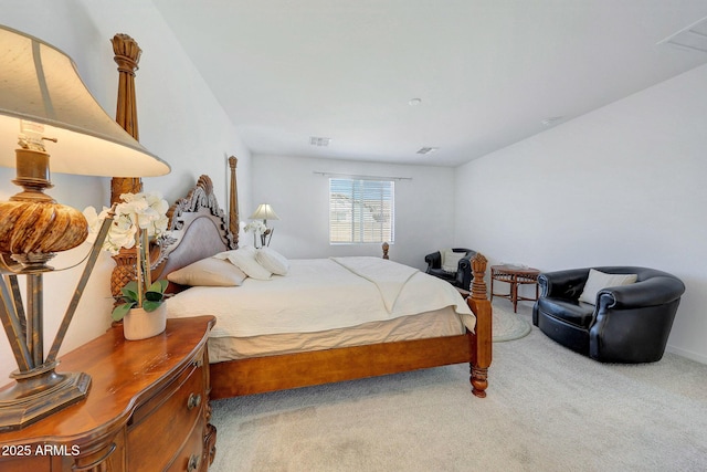 bedroom with light colored carpet