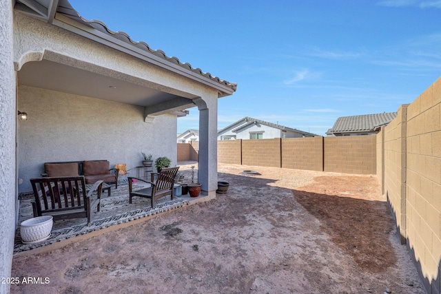 view of patio with an outdoor living space