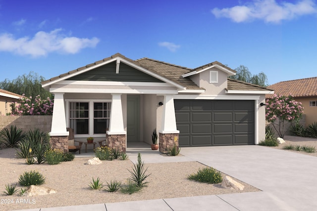 view of front of house with a porch and a garage