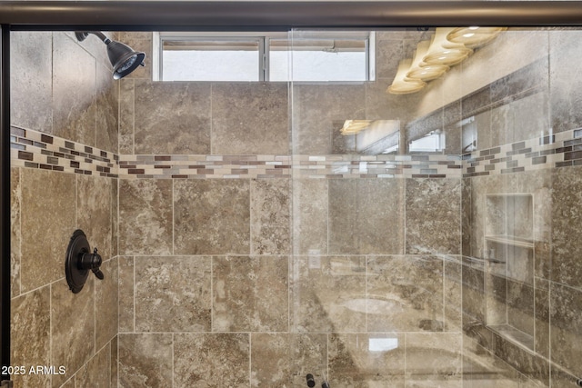 bathroom featuring a tile shower