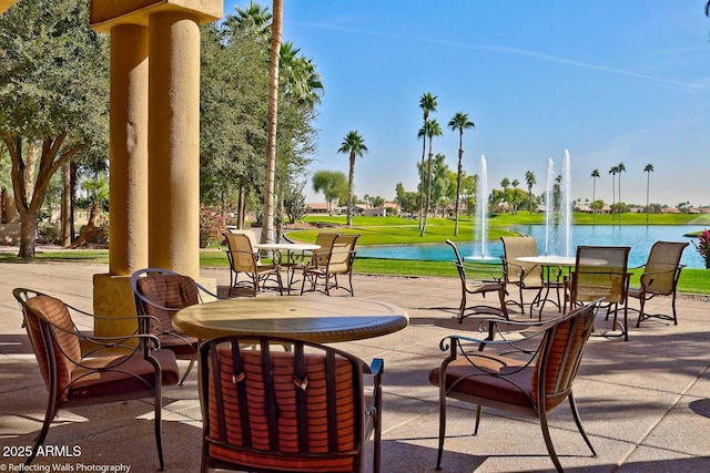 view of patio / terrace with a water view