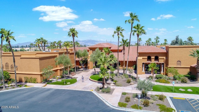 view of building exterior featuring a mountain view