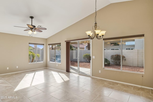 spare room with light tile patterned flooring, ceiling fan with notable chandelier, and high vaulted ceiling