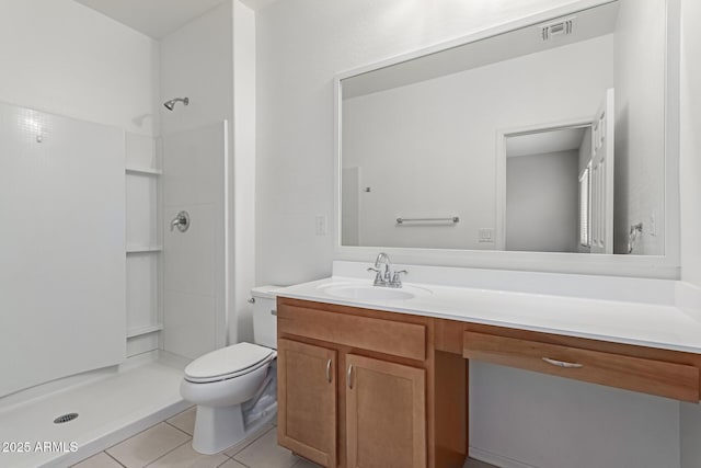 bathroom featuring walk in shower, tile patterned floors, and vanity