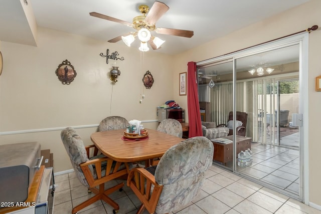 dining room with ceiling fan and light tile patterned flooring