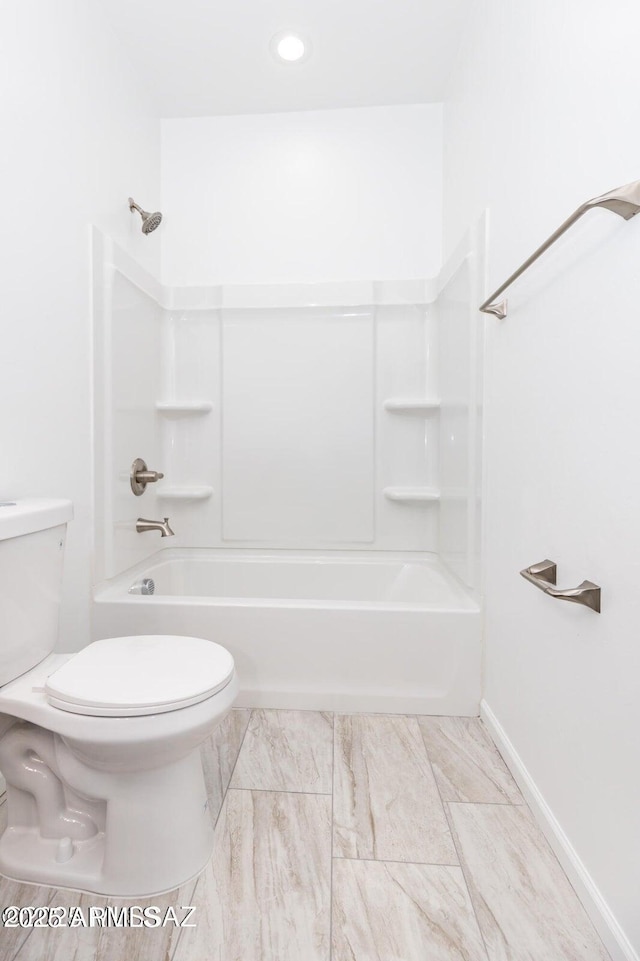 19 E Elm St, Tucson, AZ 85705 - full bath featuring toilet, shower / bathtub combination, and baseboards