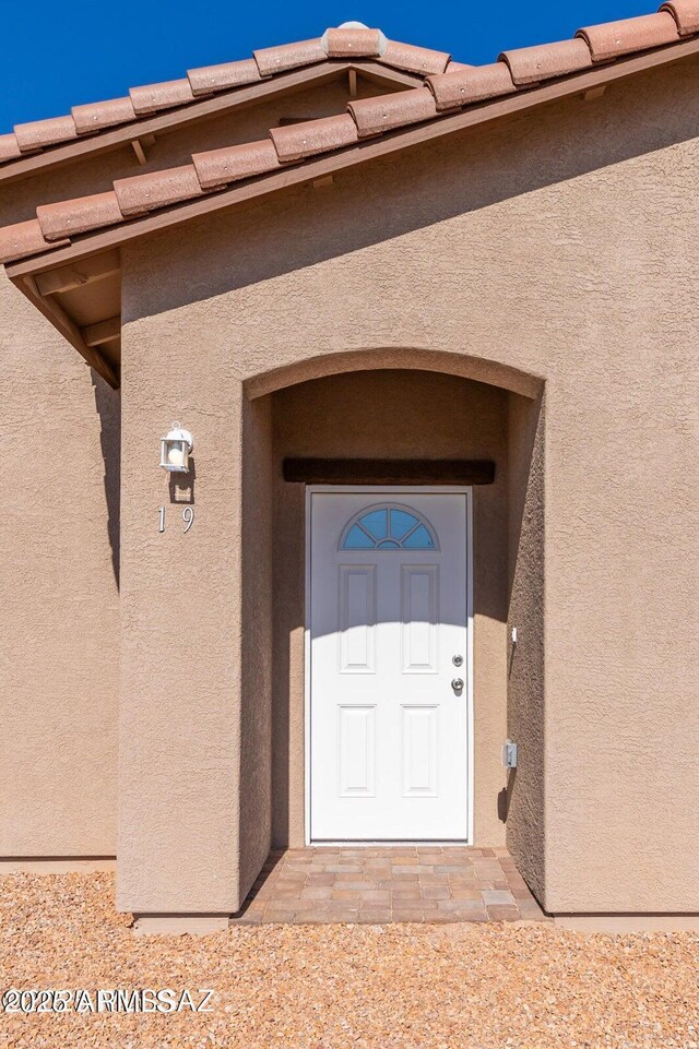 19 E Elm St, Tucson, AZ 85705 - property entrance with stucco siding