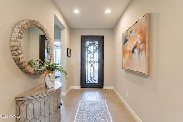 entrance foyer with light tile patterned floors