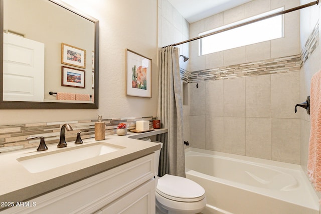 full bathroom featuring toilet, vanity, shower / bathtub combination with curtain, and decorative backsplash