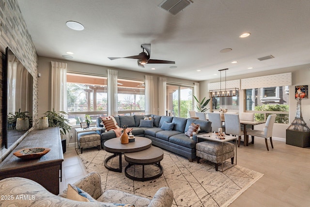 living room featuring ceiling fan