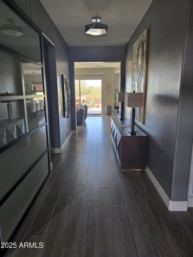 17833 E Veit Springs Dr, Rio Verde, AZ 85263 - corridor featuring baseboards and dark wood-style flooring