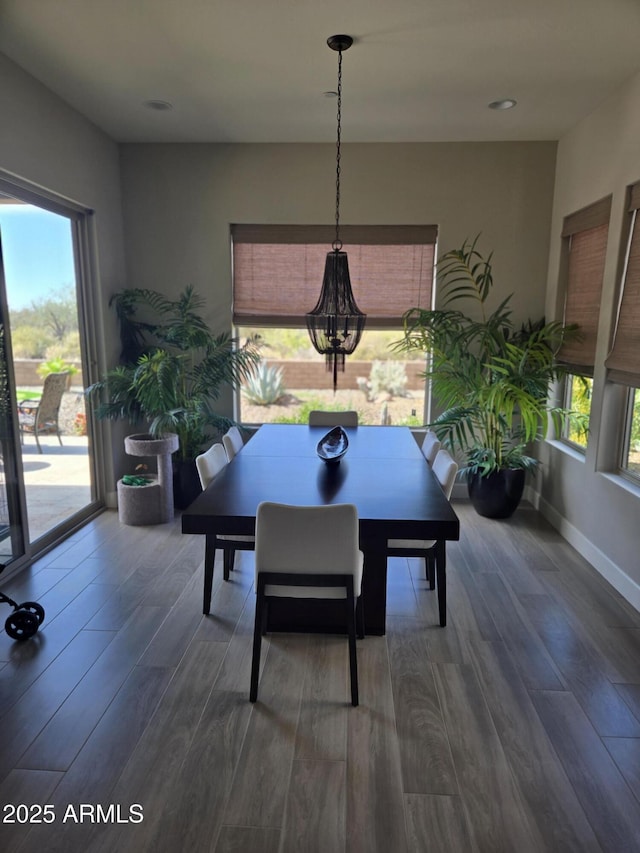 17833 E Veit Springs Dr, Rio Verde, AZ 85263 - dining area with baseboards and dark wood-style flooring