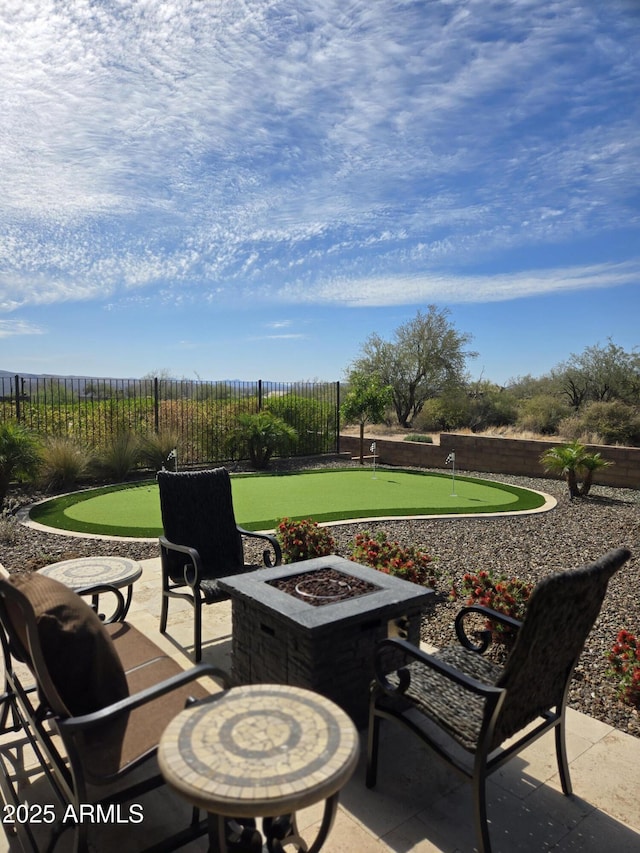 17833 E Veit Springs Dr, Rio Verde, AZ 85263 - view of patio with fence and an outdoor fire pit