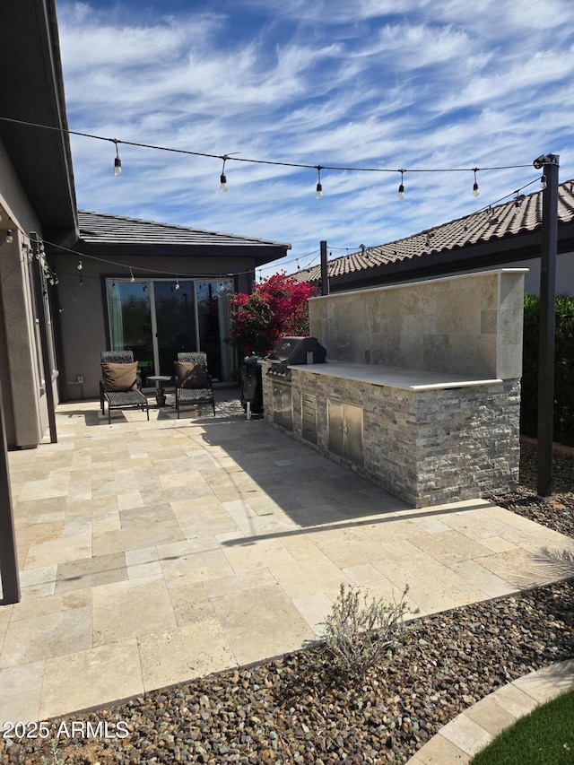 17833 E Veit Springs Dr, Rio Verde, AZ 85263 - view of patio / terrace featuring an outdoor kitchen and grilling area