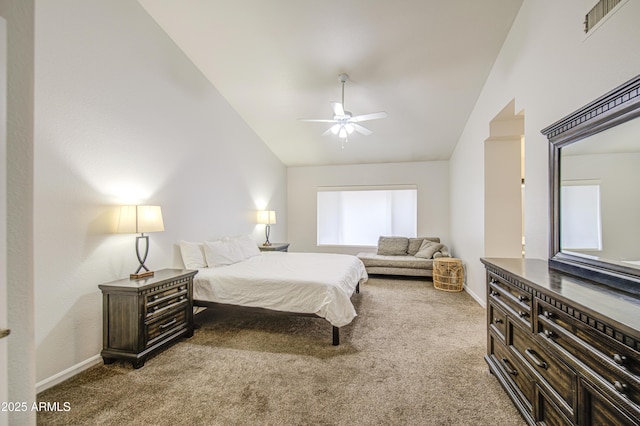 bedroom featuring carpet floors, baseboards, and lofted ceiling