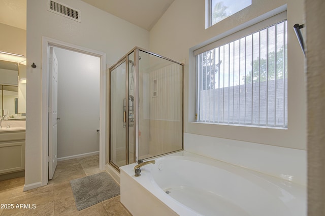 full bathroom with a bath, visible vents, a stall shower, vanity, and tile patterned floors