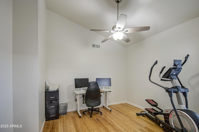 office with visible vents, light wood-style flooring, ceiling fan, and baseboards