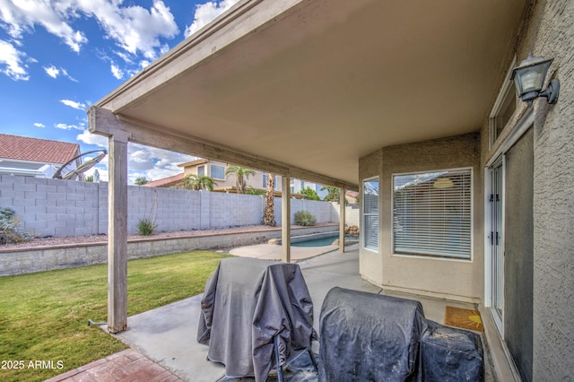 view of patio / terrace with a fenced backyard
