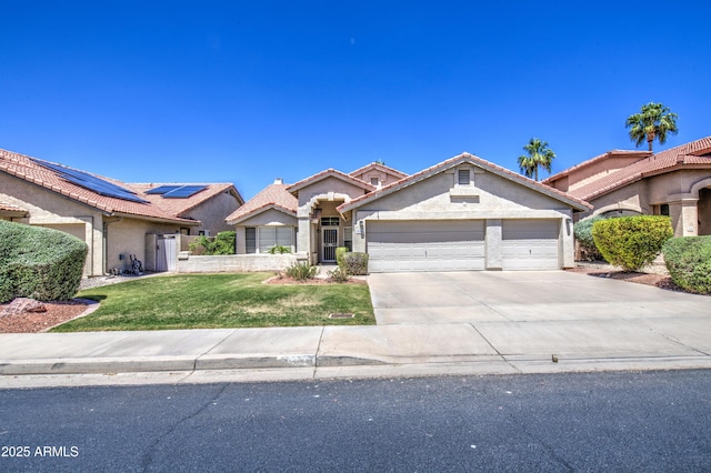 view of front of house with concrete driveway, an attached garage, a front lawn, and stucco siding