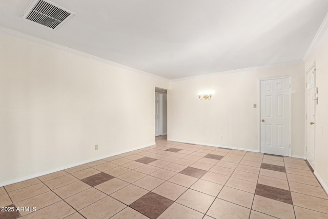 tiled empty room featuring crown molding