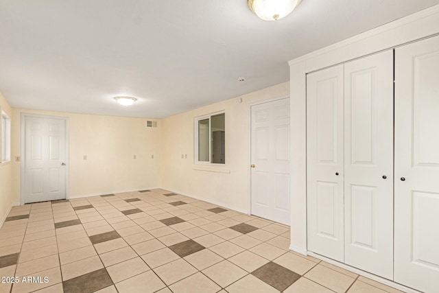 interior space featuring light tile patterned floors