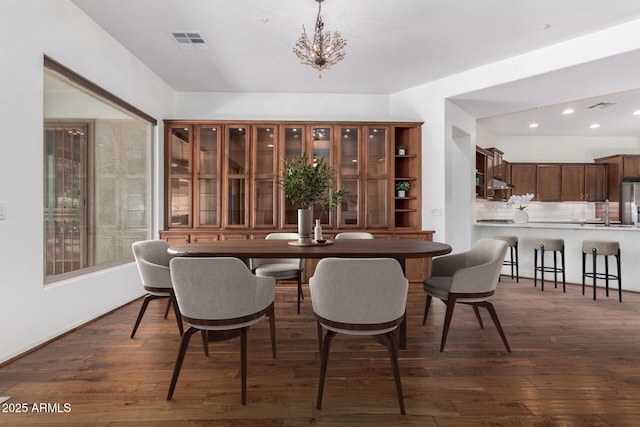 30135 N 129th Gln, Peoria, AZ 85383 - dining area featuring dark wood-style floors, a chandelier, and recessed lighting