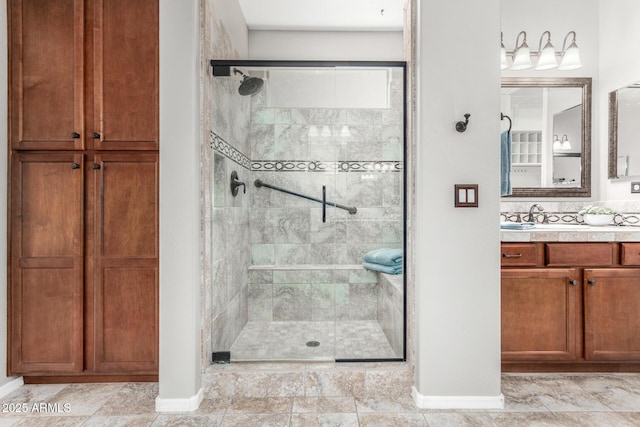 30135 N 129th Gln, Peoria, AZ 85383 - bathroom with baseboards, a stall shower, and vanity
