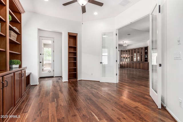 30135 N 129th Gln, Peoria, AZ 85383 - unfurnished living room featuring a ceiling fan, dark wood finished floors, recessed lighting, and baseboards