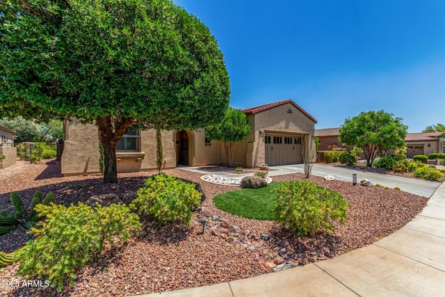 30135 N 129th Gln, Peoria, AZ 85383 - mediterranean / spanish-style home with stucco siding, driveway, and a garage