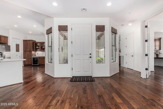 30135 N 129th Gln, Peoria, AZ 85383 - entrance foyer with beverage cooler, dark wood-type flooring, and recessed lighting